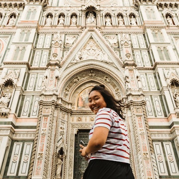 Asian tourist visiting Florence, Italy