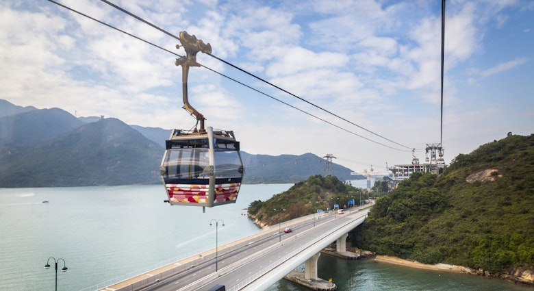 High aerial view from above from cabin of cable car ride along ropeway heading towards Lamma Island - Hong Kong. Lamma Island (Chinese: å—ä¸«å³¶), also known as Y Island or Pok Liu Chau (åšå¯®æ´²) or simply Pok Liu (åšå¯®), is the third largest island in Hong Kong.
High aerial view from above from cabin of cable car ride along ropeway heading towards Lamma Island - Hong Kong. Lamma Island (Chinese: 南丫島), also known as Y Island or Pok Liu Chau (博寮洲) or simply Pok Liu (博寮), is the third largest island in Hong Kong.
1058347032