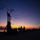 people resting at sunset beach in Gili Trawangan
669992440