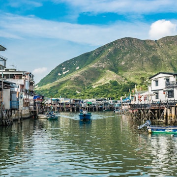 Tai O, Hong Kong, China- June 10, 2014: stilt houses and fishermen motorboats in Lantau island