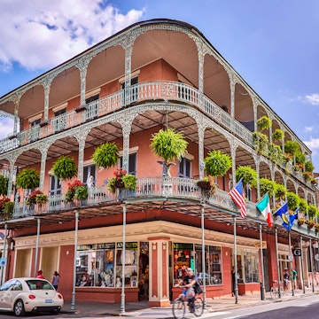 The wrought iron lace of a French Quarter Balcony in New Orleans.